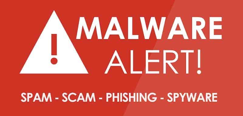 sign that says malware alert with phishing attacks, spyware and scams